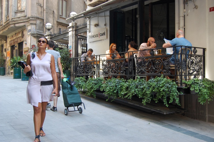 Sera walks with me and points to the new balconies outside bars which hold limited table and chair spaces: ‘It’s ugly!’ she exclaims