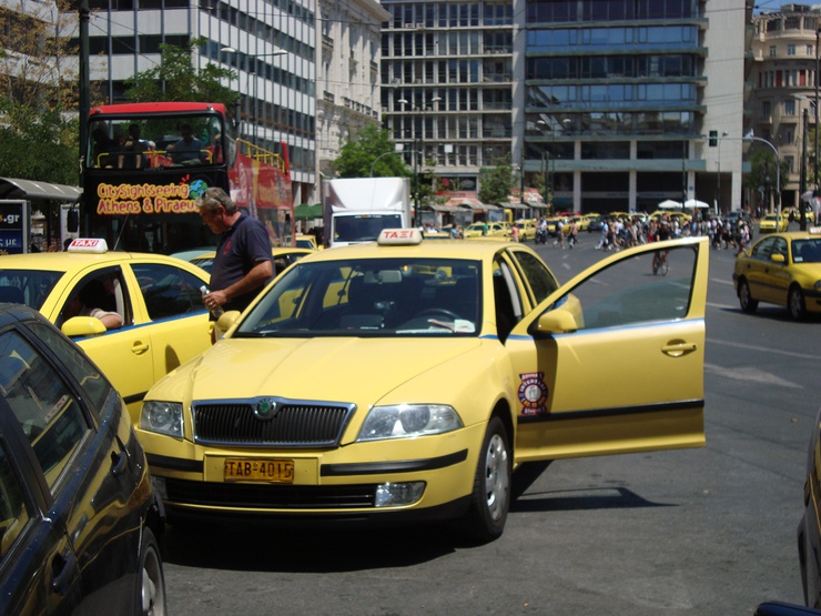 Con sus taxis amarillos