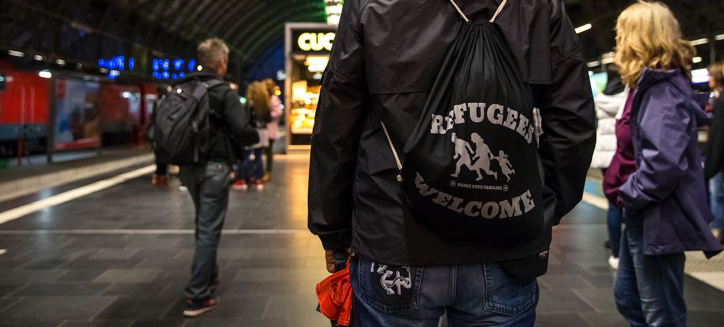 Image for The refugees turned volunteers at Amsterdam Centraal