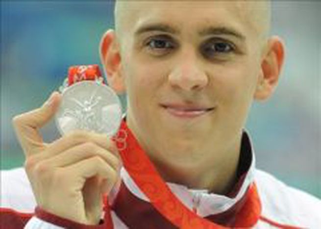 Image for Phelps was unbeatable, but Cseh won 3 silvers for Hungary